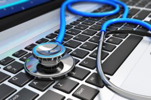 stethoscope and laptop